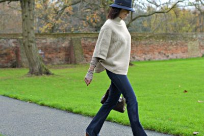 Laura Ashley poncho | Laura Ashley blue fedora | J Brand jeans flares | Louis Vuitton sully bag | Marc by Marc Jacobs tan wedge heel shoes